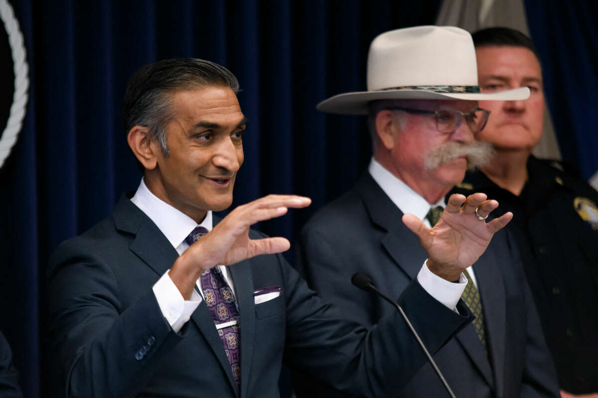 US Attorney for the Southern District of Texas Alamdar S. Hamdani (L) speaks during a news conference in Houston, Texas, on April 1, 2024. Hamdani announced that the US has charged 41 individuals in a 50-count indictment alleging cocaine, fentanyl, heroin and meth trafficking crimes in the Houston and Galveston areas linked to the Jalisco New Generation Cartel. (Photo by Mark Felix / AFP) (Photo by MARK FELIX/AFP via Getty Images)