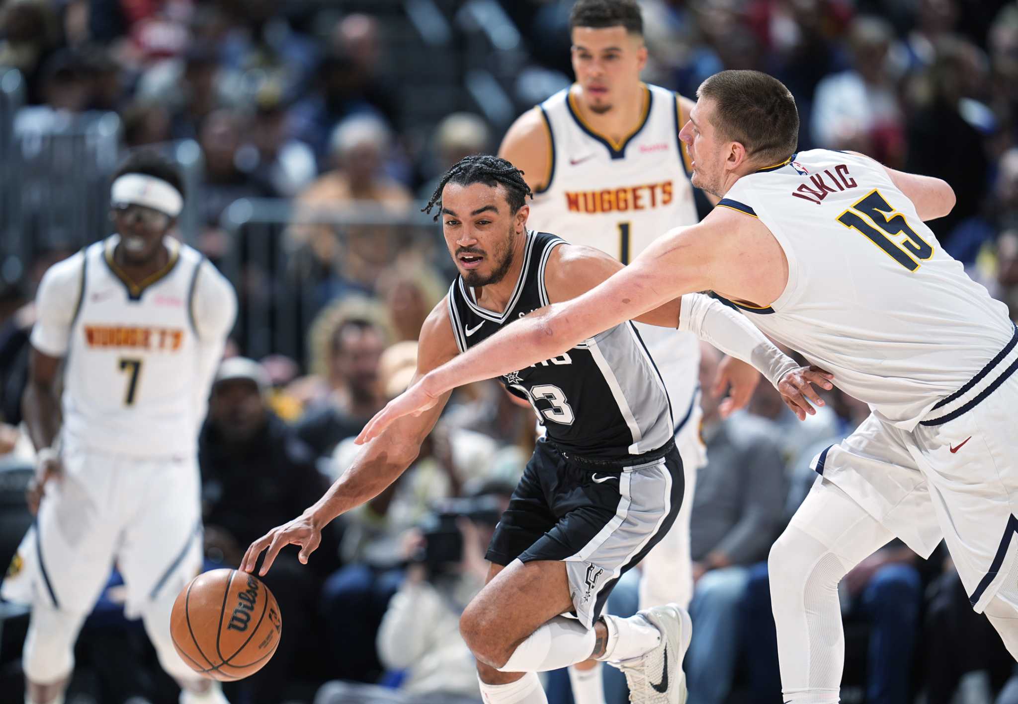 Spurs' Tre Jones joins elite company with triple-double in Denver
