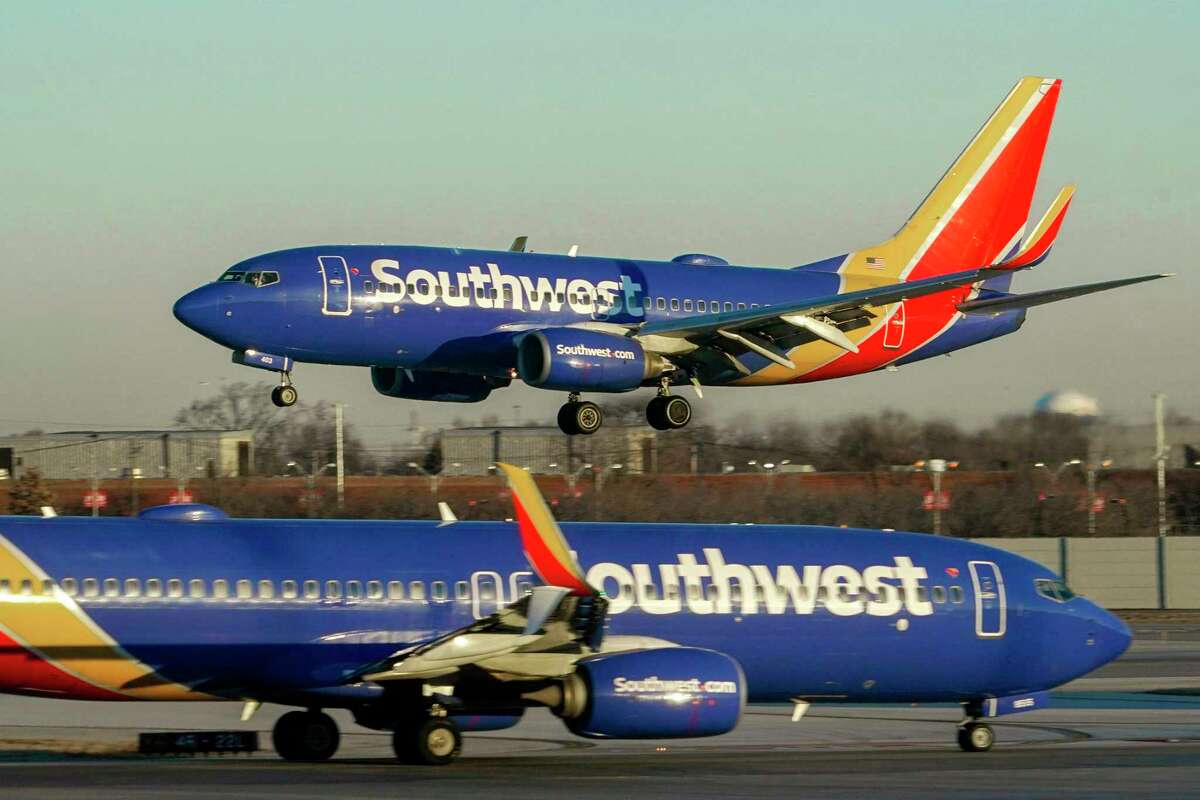 FILE - Southwest Airlines plane prepares to land at Midway International Airport, Feb. 12, 2023, in Chicago. Federal officials are investigating a reported engine fire that forced a Southwest Airlines plane to cancel takeoff and return to the gate at the Lubbock, Texas, airport on Thursday, April 4, 2024.