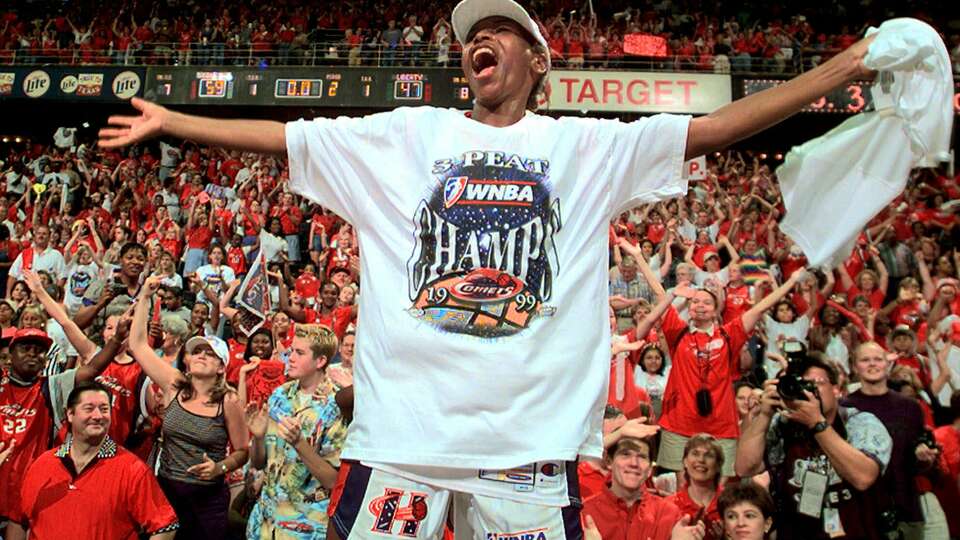 Houston Comets' Cynthia Cooper celebrates after the Comets beat the New York Liberty 59-47 to win the WNBA Finals Sunday, Sept. 5, 1999 in Houston. The Comets have won three straight championships. (AP Photo/David J. Phillip)