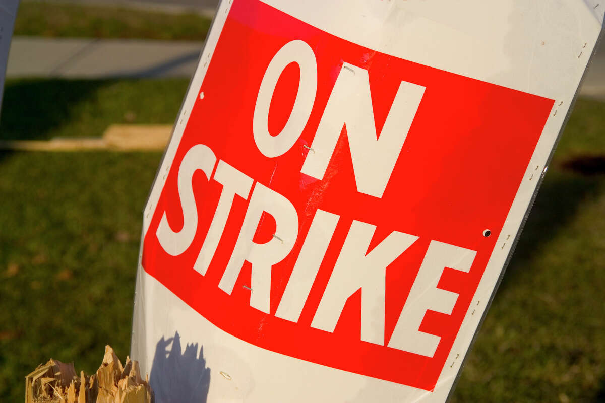 Journalists with the Austin-American Statesman said they are on strike for the next four days protesting unfair labor practices against the parent company Gannett. 