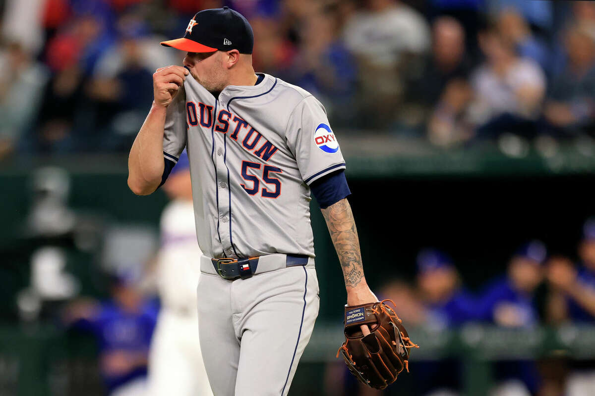 Ryan Pressly #55 of the Houston Astros reacts after giving up a single to Adolis GarcÃ­a #53 of the Texas Rangers during the eighth inning at Globe Life Field on April 6, 2024 in Arlington, Texas.