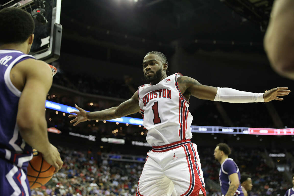 Houston Cougars guard Jamal Shead (1) guards an inbounds pass in the first half of a Big 12 tournament quarterfinal game between the TCU Horned Frogs and Houston Cougars on Mar 14, 2024 at T-Mobile Center in Kansas City, Missouri.