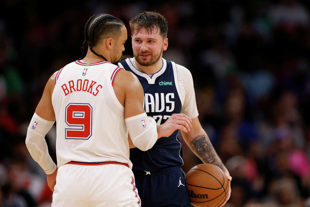 Luka Doncic #77 of the Dallas Mavericks reacts in the second half against the Houston Rockets at Toyota Center on March 31, 2024 in Houston, Texas. 