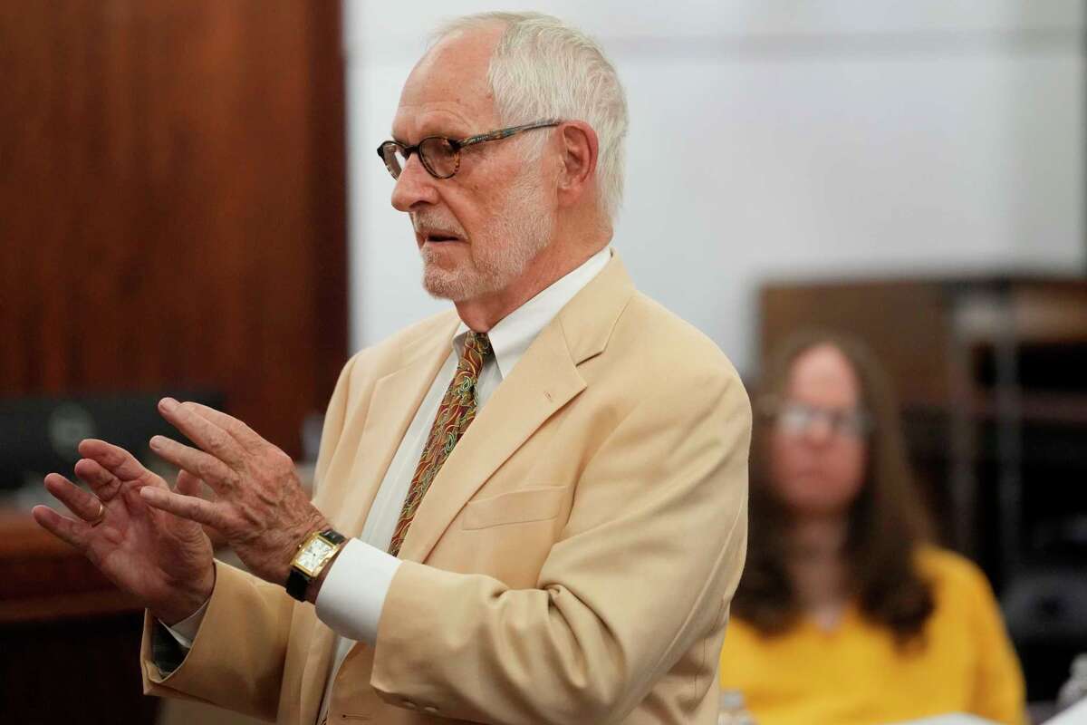 Defense attorney James Stafford, left, and his client Brian Coulter are shown as prosecutor Celeste Byrom speaks during his capital murder bench trial with Judge Kelli Johnson in the 178th District Court of the Harris County Criminal Justice Center Tuesday, April 9, 2024, in Houston. Coulter is accused of beating to death 8-year-old Kendrick Lee, who was the son of his girlfriend, Gloria Williams.