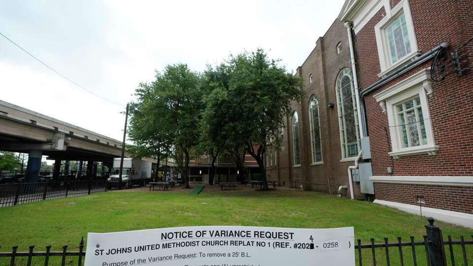 A sign for a notice of variance request is shown outside the St. John's United Methodist Church, 2019 Crawford St., is shown Tuesday, April 9, 2024, in Houston.