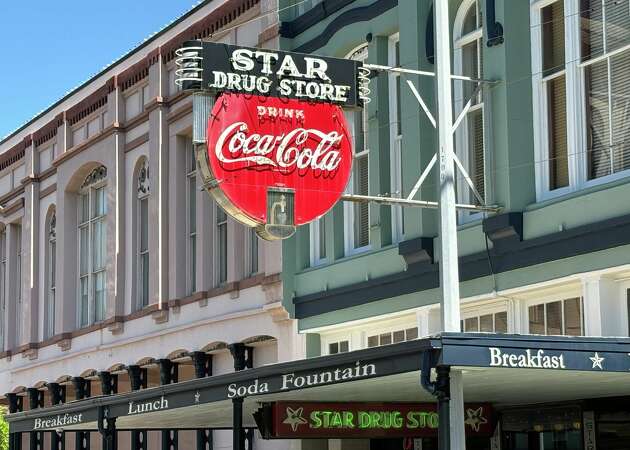 Star Drug Store's fully restored neon and porcelain sign is one of Galveston's most recognizable logos.