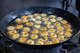 Article Image Doughnut-shaped vadas get fried in the kitchens of Shiva-Vishnu Temple in Livermore on Sunday, March 24, 2024.