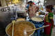 Article Image Chefs prepare sambar in the kitchens of the Shiva-Vishnu Temple in Livermore on Sunday, March 24, 2024.