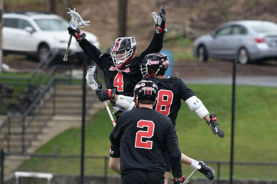 New Canaan boys lacrosse defeats Ridgefield in FCIAC matchup