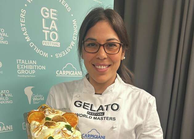 Maria Florencia Mansile of La Argentina Gelato & Coffee in Katy, Texas holds her winning entry at the Gelato Festival World Masters competition in Houston, Texas on April 11, 2024.