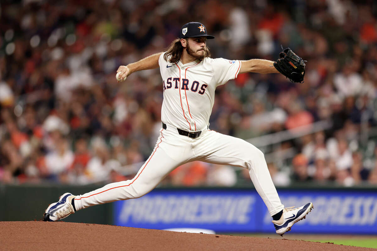 Spencer Arrighetti #41 of the Houston Astros pitches in the first inning against the Atlanta Braves at Minute Maid Park on April 15, 2024 in Houston, Texas. All players are wearing the number 42 in honor of Jackie Robinson Day. 