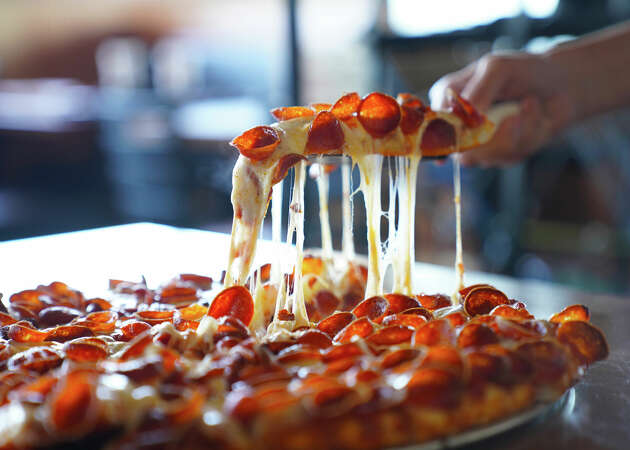 A slice of pepperoni (cupped, of course) at Mountain Mike's Pizza.