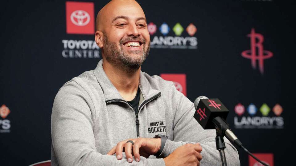 Rockets general manager Rafael Stone laughs during a press conference following the end of the team's season Tuesday, April 16, 2024, at the Toyota Center in Houston.