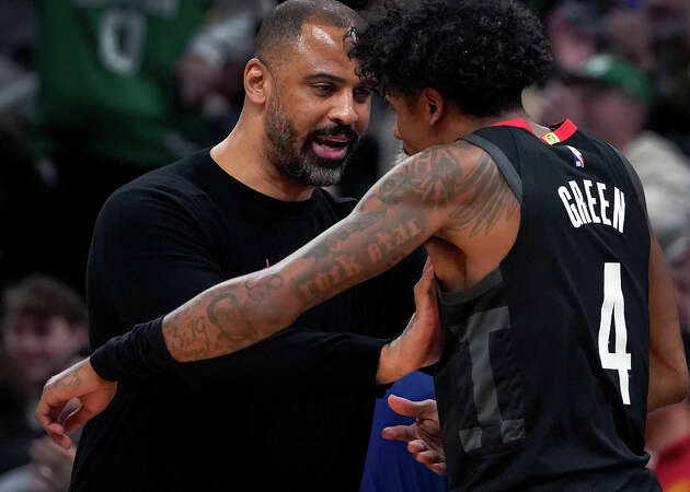 Houston Rockets head coach Ime Udoka talks with SG Jalen Green in the first quarter. The Boston Celtics beat the Rockets, 145-113. 