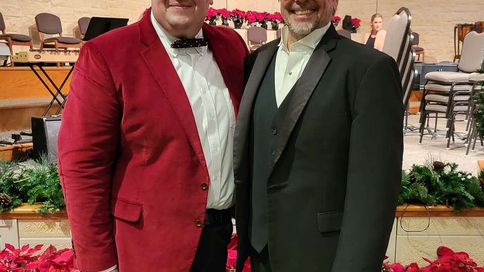 Woodlands resident Mihai Vatca, left, is pictured with Woodlands Symphony Orchestra Artistic Director Darryl Bayer, right. Born in Romania, Vatca is currently adjunct professor of piano at Sam Houston State University and serves as pianist at Christ Church United Methodist in The Woodlands. Vatca will perform as a part of the symphony May 5 concert. 
