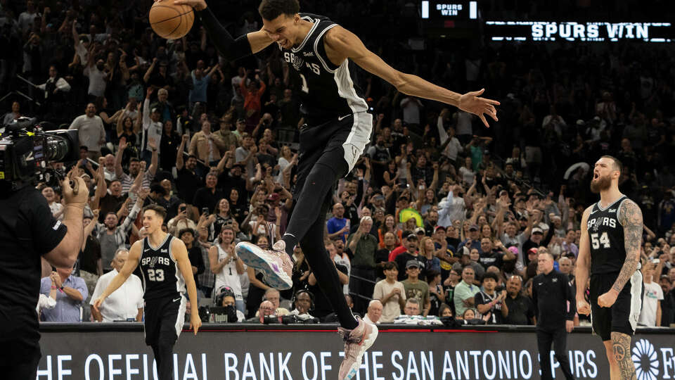 San Antonio Spurs center Victor Wembanyama (1) celebrates as the clock runs out in the second half after winning their NBA game with the Denver Nuggets at the Frost Bank Center on Friday, April 12, 2024 in San Antonio. Spurs won 121-120.