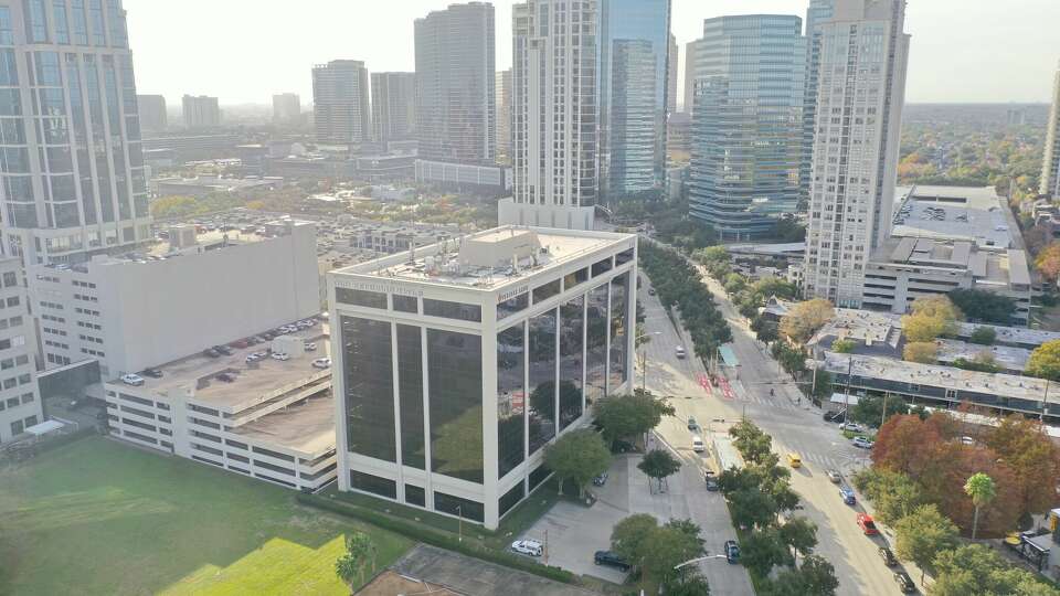 Tilman Fertitta recently bought a 9-story office building near Post Oak Hotel, among a string of recent deals deepening his real estate investments in Houston.