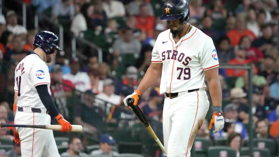 Houston Astros Jose Abreu (79) reacts after striking out during the sixth inning of an MLB baseball game at Minute Maid Park on Wednesday, April 17, 2024, in Houston.