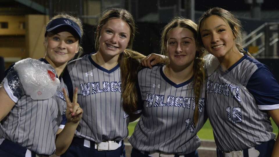 The Tomball Memorial Wildcats are riding a three-game winning streak to give themselves a chance at making the playoffs. From left to right: Emma Sherman (P/1B), Savannah Wiggins (P/1B), Lainey Matusewitch (C) and  Emma Coombs (P/1B).