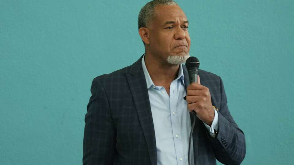 Texas State District 15 candidate Jarvis Johnson debates with fellow Democratic primary candidate Molly Cook on Wednesday, April 17, 2024 in Houston. The debate was sponsored by the Bayou Blue Dems for the runoff election that will fill Houston Mayor John Whitmire's former Senate seat.