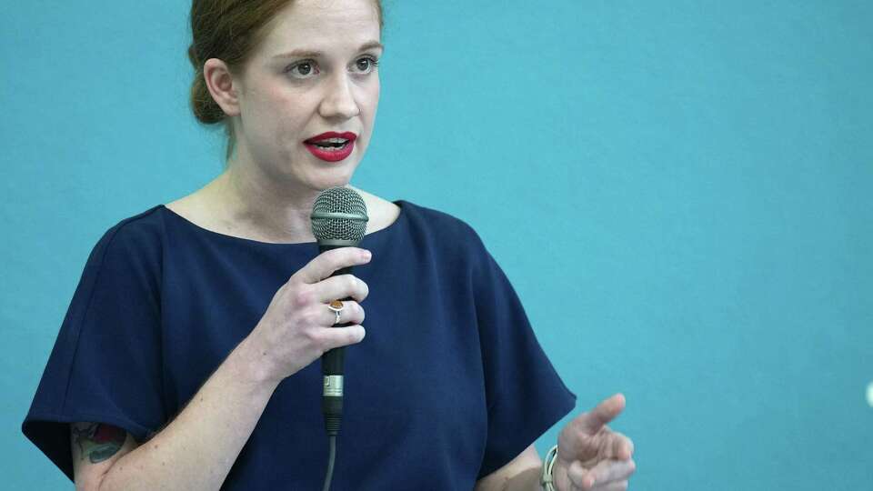 Texas State District 15 candidate Molly Cook debates with fellow Democratic primary candidate, Jarvis Johnson, on Wednesday, April 17, 2024 in Houston. The debate was sponsored by the Bayou Blue Dems for the runoff election that will fill Houston Mayor John Whitmire’s former Senate seat.