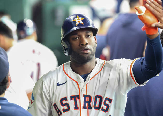 HOUSTON, TX - APRIL 17: Houston Astros left fielder Yordan Alvarez (44) gets high fives from teammates in the home dugout after hitting a home run in the bottom of the first inning during the MLB game between the Atlanta Braves and Houston Astros at Minute Maid Park on April 17, 2024 in Houston, Texas. (Photo by Leslie Plaza Johnson/Icon Sportswire via Getty Images)