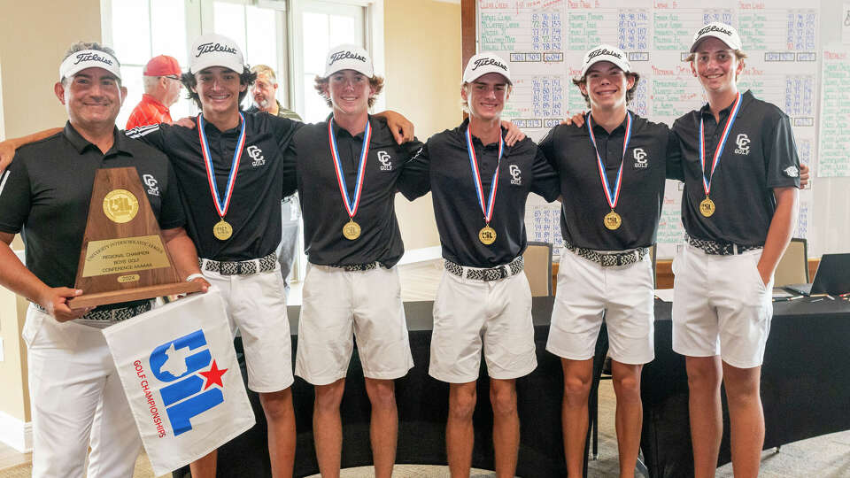 Clear Creek coach Daniel Brown, far left, stands with his team, from inside left, Clark Rangel, Carter McCaffrey, JT Waltzer, Max McClosky and Blake Harwell, who placed first in the team competition in the the Region III-6A boys golf tournament at Eagle Point Golf Club, Thursday, April 18, 2024, in Mont Belvieu.