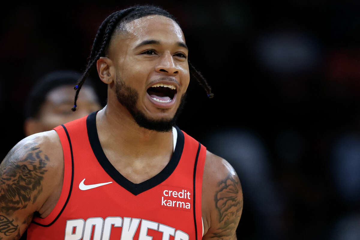 Cam Whitmore #7 of the Houston Rockets reacts to a three point basket against the Los Angeles Lakers during the first half at Toyota Center on January 29, 2024 in Houston, Texas.