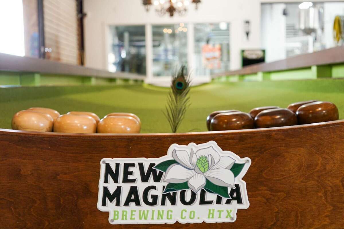 Feather bowling at New Magnolia Brewing Co. in the Heights