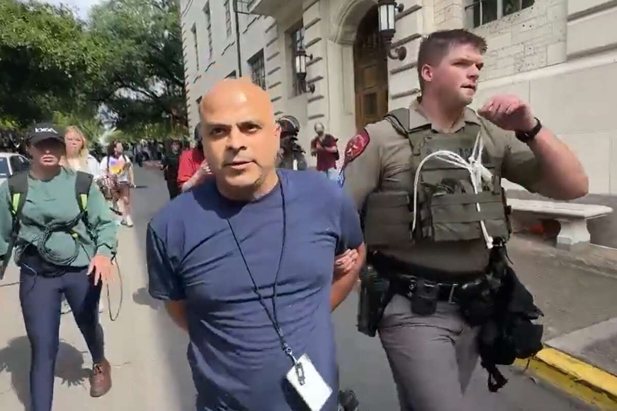 A FOX 7 journalist was seen in custody after coming into contact with law enforcement at a pro-Palestinian demonstration at UT-Austin on Wednesday.