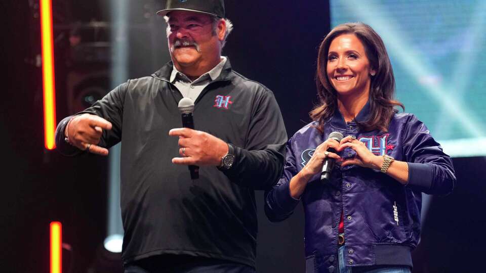 Houston Texans Principal Owner Cal McNair, left, alongside McNair’s wife and vice president of the Houston Texans Foundation, Hannah McNair, speak to fans during the team's four fan-inspired uniform release party at 713 Music Hall, Tuesday, April 23, 2024, in Houston. The team received survey results from more than 10,000 fans giving their input on what they’d like to see and hosted more than 30 focus groups with fans and players to get their feedback.