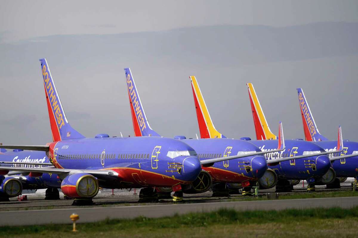 FILE - A line of Southwest Air Boeing 737 jets are parked near the company's production plant while being stored at Paine Field Friday, April 23, 2021, in Everett, Wash. Southwest Air reports earnings on Thursday, April 25, 2024.