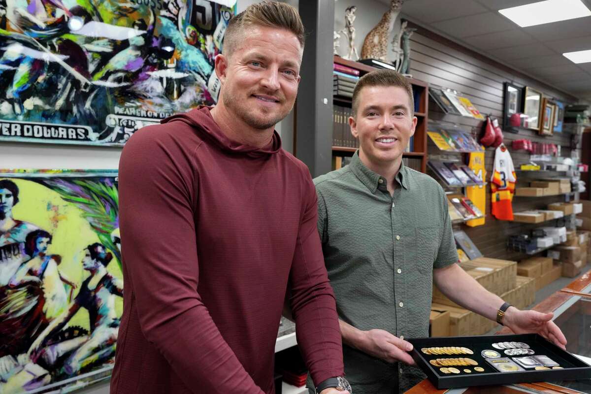 Brothers and U.S. Coins and Jewelry Co-Owners Kenny Duncan Jr., left, and Matthew Duncan pose for a photograph Wednesday, April 24, 2024 in Houston. April 21-27 is the National Coin Week.