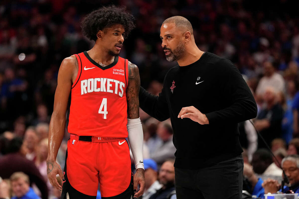 Head coach Ime Udoka of the Houston Rockets talks to Jalen Green #4 during the second half against the Dallas Mavericks at American A