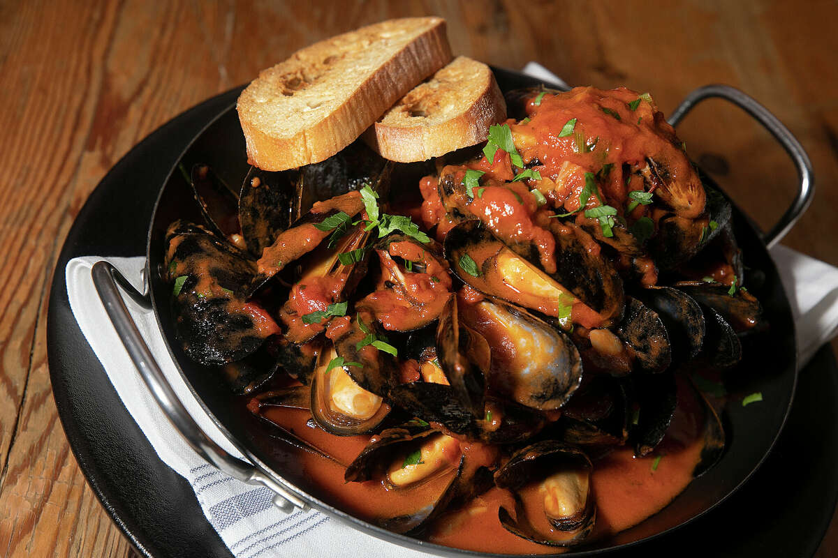 Mussels on the menu at Viron Rondo Osteria in Cheshire, Conn., Thursday, April 25, 2024. The mussels dish features plum tomatoes, sweet roasted garlic, Calabrian chili flakes and grilled crostini.