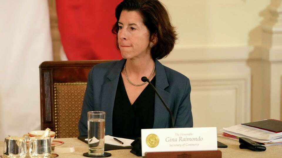 Commerce Secretary Gina Raimondo attends a trilateral meeting with President Joe Biden, Philippine President Ferdinand Marcos Jr., and Japanese Prime Minister Fumio Kishida in the East Room of the White House in Washington, Thursday, April 11, 2024.