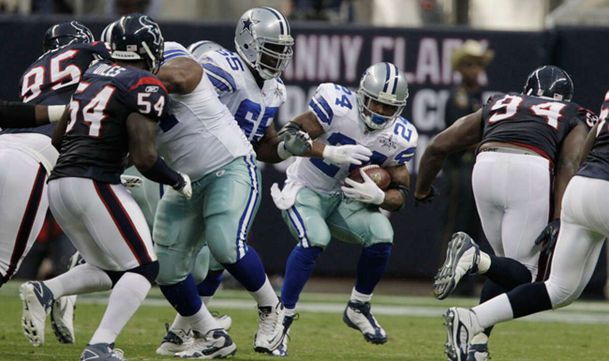 Cowboys running back Marion Barber (24) cuts through the Houston Texans' defense earlier this preseason. Barber and Felix Jones combined for just 44 yards on 21 preseason carries.