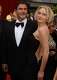 Article Image Actress Sharon Stone, right, and her then-husband Phil Bronstein arrive at the 74th Annual Academy Awards at the Kodak Theatre in Hollywood on March 24, 2002.