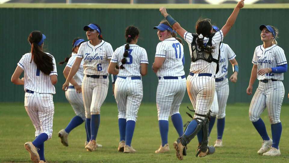 The Katy Taylor softball team celebrate after defeating Ridgepoint during the UIL Region III - 6A Bi-Distict game held at Jordan High School on Friday, April 26, 2024, in Fulshear.