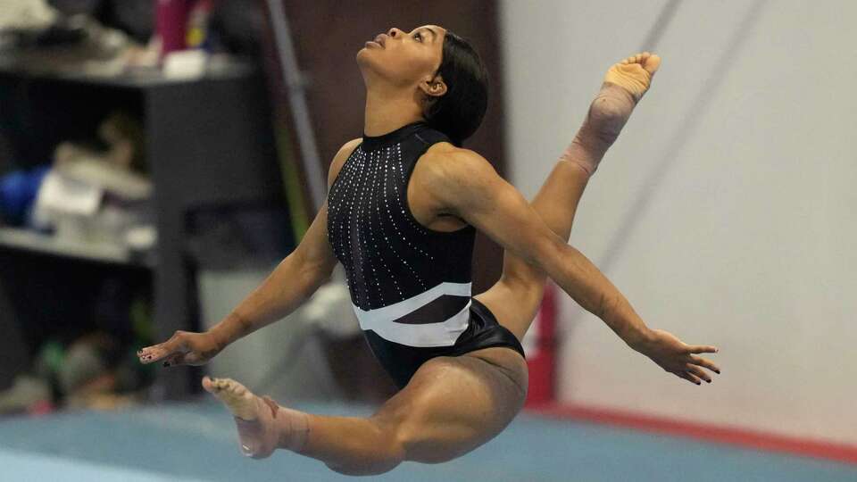 Gabby Douglas performs her floor routine while competing at the American Classic Saturday, April 27, 2024, in Katy, Texas. (AP Photo/David J. Phillip)