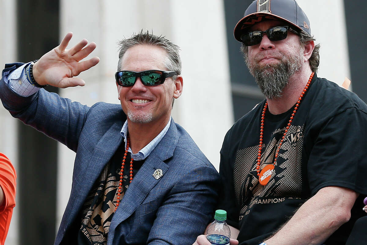 Former Houston Astros and Hall of Famers Craig Biggio and Jeff Bagwell wave to the crowd during the Houston Astros Victory Parade on November 3, 2017 in Houston, Texas. The Astros defeated the Los Angeles Dodgers 5-1 in Game 7 to win the 2017 World Series. 