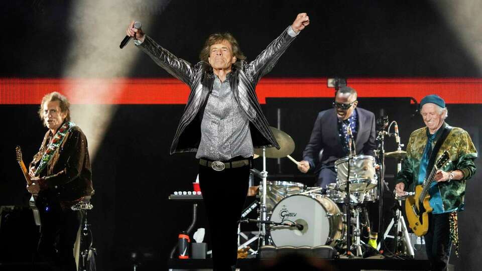 Mick Jagger, center, with bandmates Ronnie Wood, left, and Keith Richards, of The Rolling Stones perform during the opening night of the Stones' 'Hackney Diamonds' tour at NRG Stadium on Sunday, April 28, 2024 in Houston.