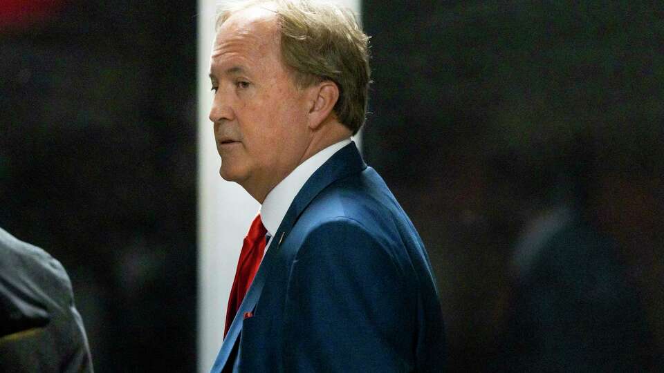 Texas Attorney General Ken Paxton arrives with former President Donald Trump at Manhattan criminal court before Trump's trial in New York, Tuesday, April 30, 2024. (Justin Lane/Pool Photo via AP)