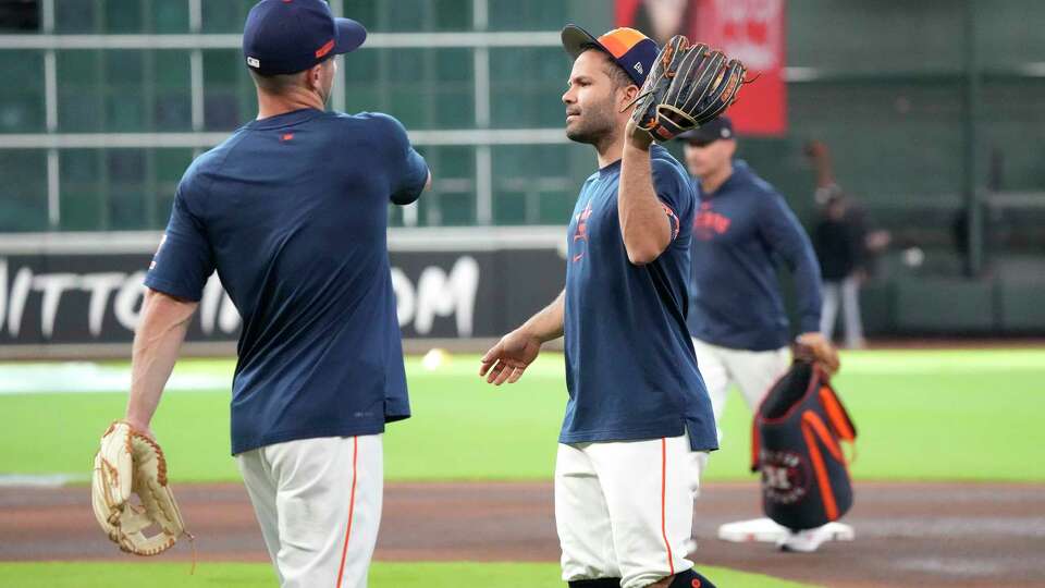 Houston Astros Jose Altuve and Alex Bregman during batting practice before the start of an MLB baseball game at Minute Maid Park on Tuesday, April 30, 2024, in Houston.