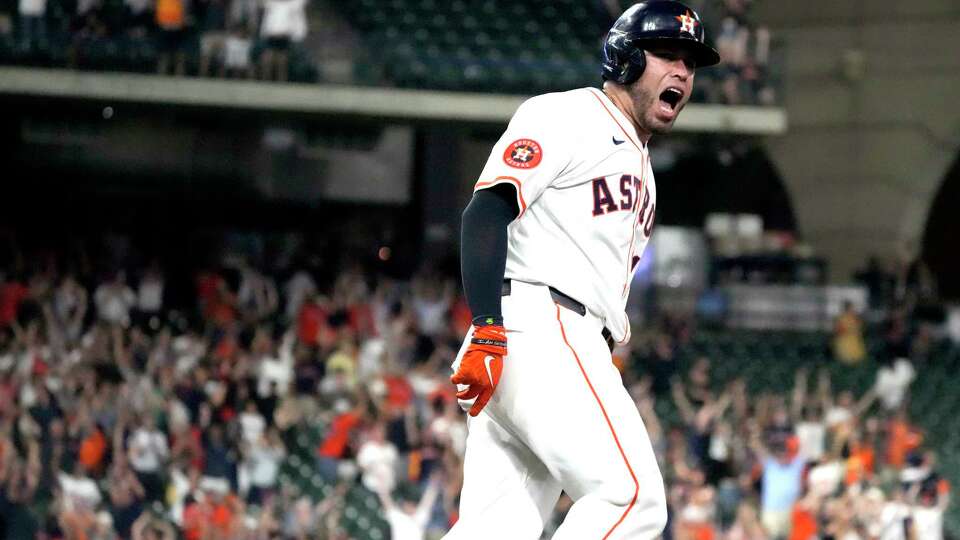 Houston Astros Victor Caratini (17) screams after his walk off home run during the tenth inning of an MLB game at Minute Maid Park on Tuesday, April 30, 2024, in Houston.
