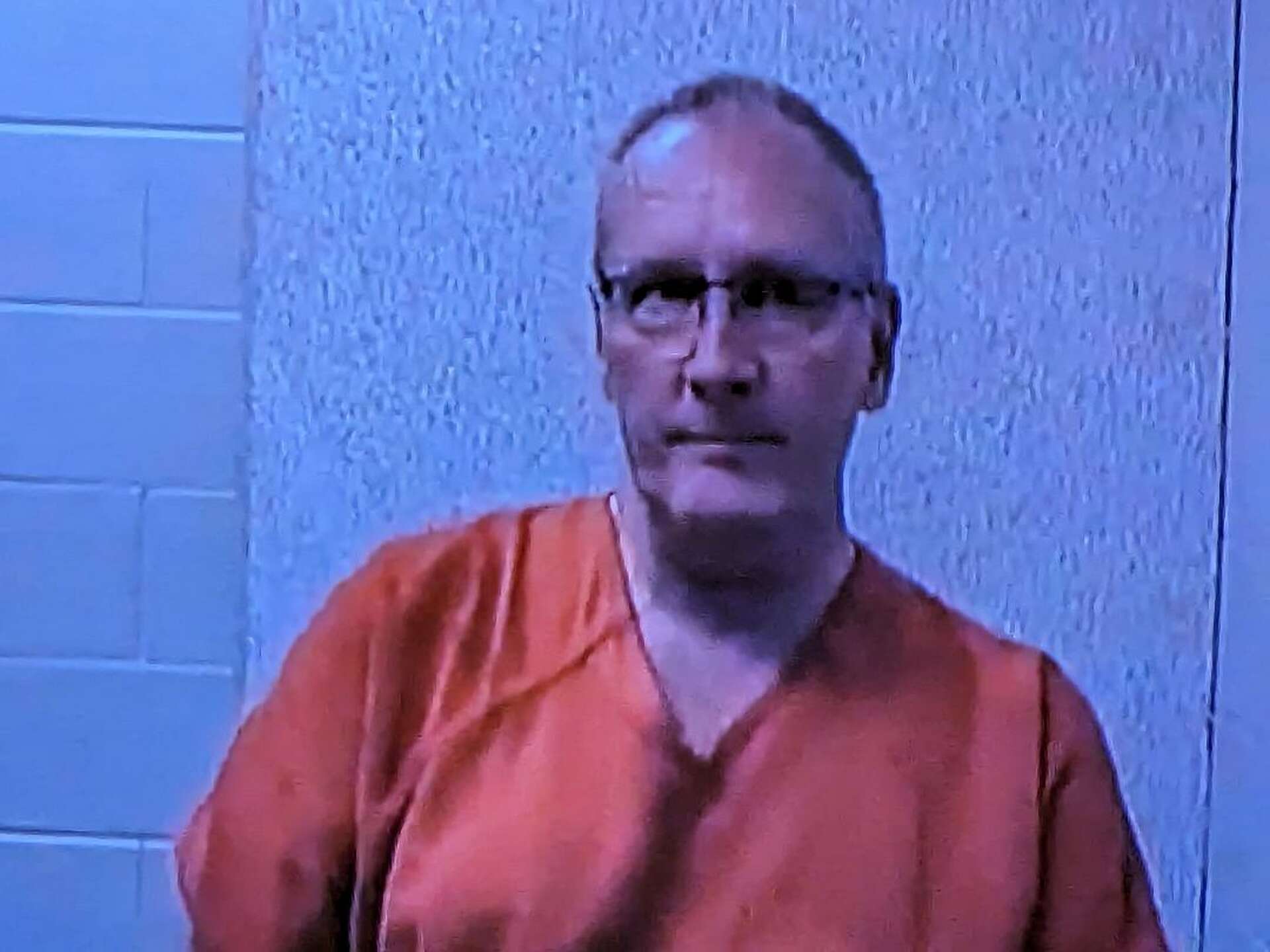 Hemlock man charged in his wife's death, held without bond