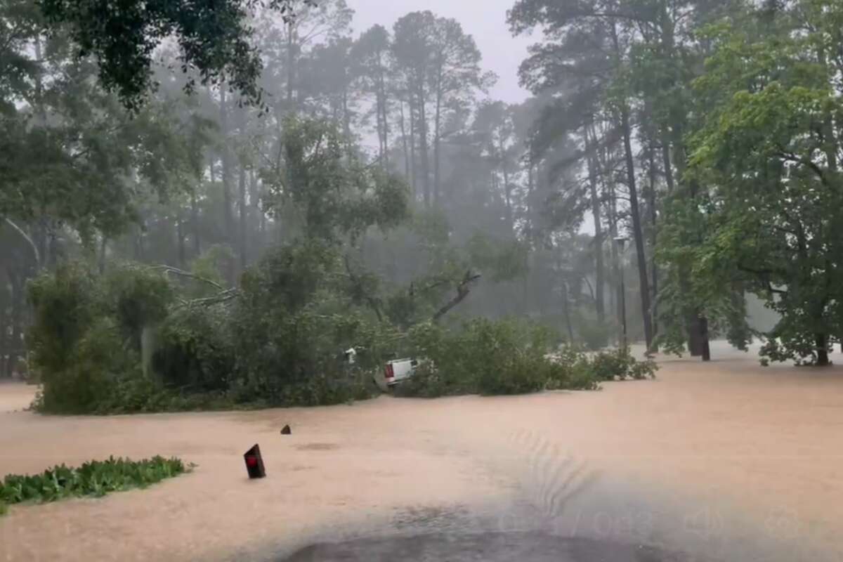 Floodwaters continue to rise north of Houston as a severe weather system continues to dump heavy precipitation on southeast Texas, overrunning dams and rivers in the region. 