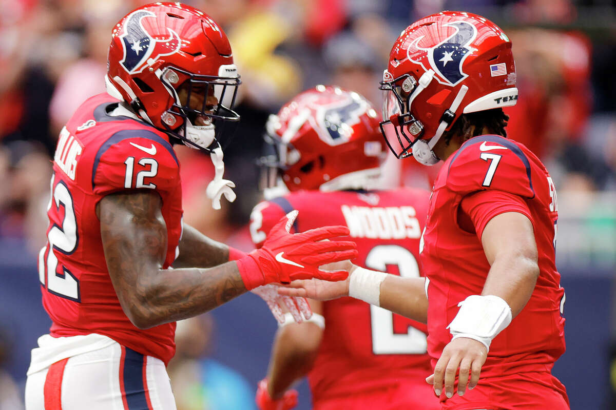 Nico Collins #12 of the Houston Texans and C.J. Stroud #7 of the Houston Texans celebrate after Collins' receiving touchdown during the first quarter against the Pittsburgh Steelers at NRG Stadium on October 01, 2023 in Houston, Texas.