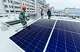 Workers install photovoltaic panels on the factory roof of a textile company in Haian, Jiangsu province, China, April 30, 2024. Workers install photovoltaic panels on the roof of a textile factory in Haian, Jiangsu province, China, April 30, 2024.